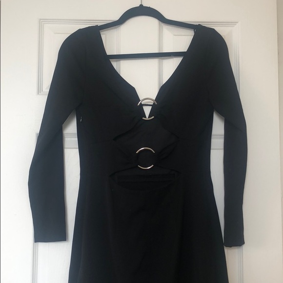 Mini black form fitting mini dress w long sleeves. - Picture 2 of 4